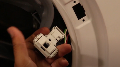 Comment changer la sécurité de porte d’un lave-linge ?